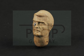 Production made James Bond (Roger Moore) puppet head