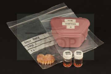 The Snipper (Emily Booth) dentures & contact lenses